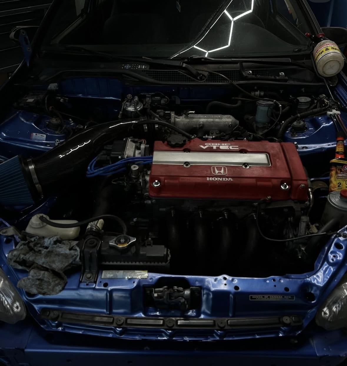 Detailed engine bay with custom intake at Jassal Performance